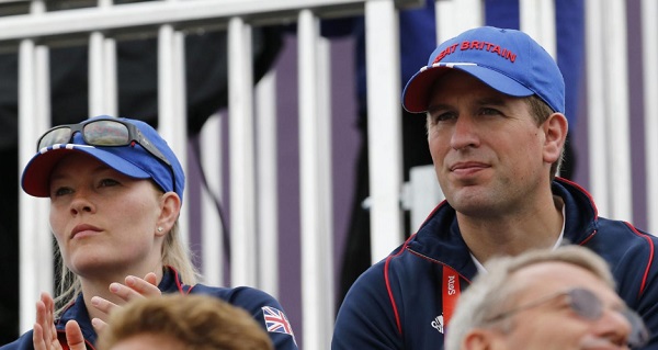 FILE PHOTO: Britain's Peter Phillips and his wife Autumn (L) attend the Eventing Jumping equestrian event at the London 2012 Olympic Games in Greenwich Park, July 31, 2012. REUTERS/Mike Hutchings The tabloid said Phillips, the eldest of the British monarch’s
