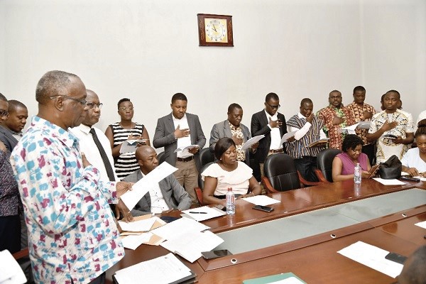 Prof. Kwame Kyere, Chairman of the Governing Council of the Allied Health Professions committees administering the oath to the members. Picture: EBOW HANSON