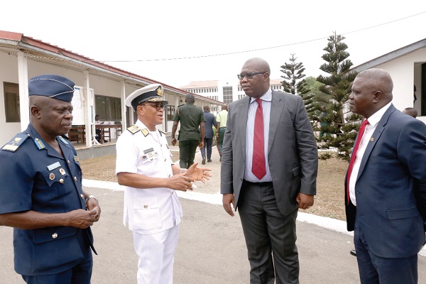Rear Admiral Moses Beick-Baffour (2nd left), Commandant, Ghana Armed Forces Command & Staff College (GAFCSC), with Mr Egbert Faibille (2nd right), Chief Executive Officer, Petroleum Commission; Mr Richard Addo Darko (right) and Air Commodore Isaac Wayoe (left), Deputy Commandant