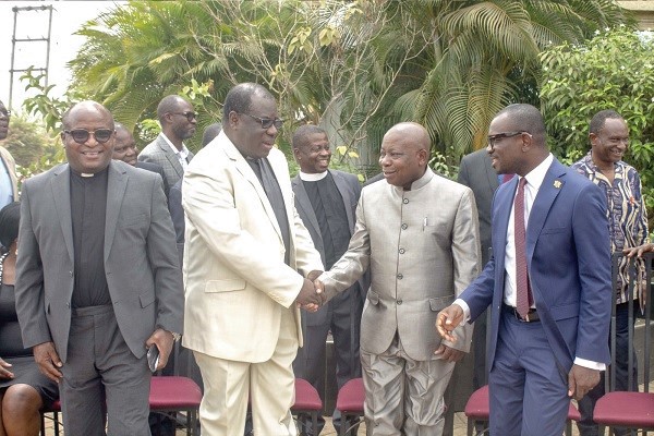  Rt Rev. Prof. Joseph Obiri Yeboah Mante (2nd left) in a handshake with Mr Kwaku Agyeman-Manu after the forum. Looking on are Mr Kennedy Osei Nyarko (right), Deputy Minister of Agriculture and Rev. Dr Godwin Nii Noi Odonkor (left), Clerk of the General Assembly, PCG. 