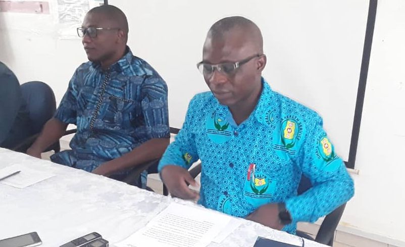 The Upper East Regional Director of the Ghana Health Service,Dr Winfred Ofosu(second right wearing GHS African wear) addressing the media.
