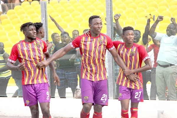 Kofi Kodzi (middle) celebrating his winning goal with teammates.