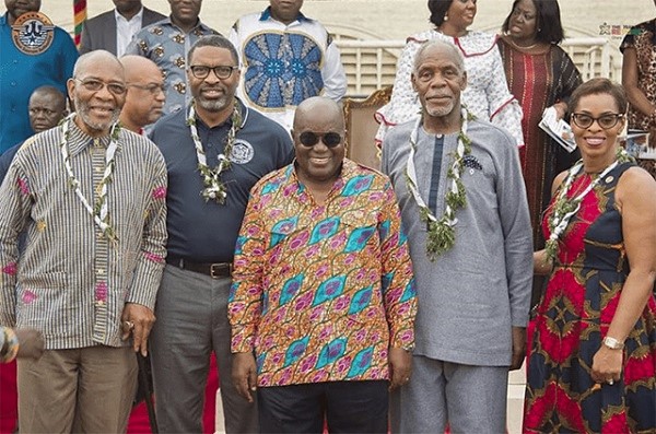 President Akufo-Addo with some Diasporans who returned home last year