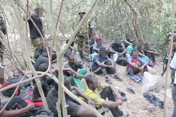 Some of the suspected recruits rounded up at the camp. Picture: Maxwell Ocloo