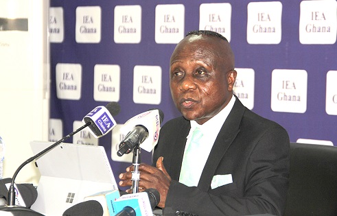 Dr John K. Kwakye, Research Director, Institute of Economic Affairs, addressing journalists at the media briefing.
