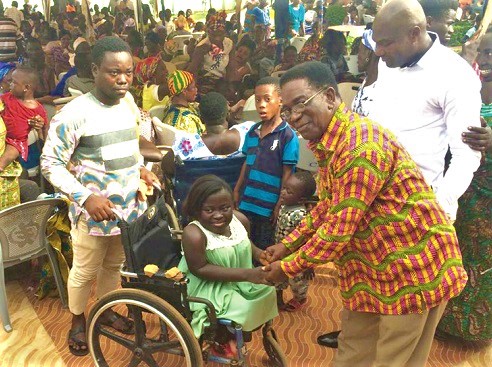 Prof Kwesi Yankah interacting with one of the PWDs during the event