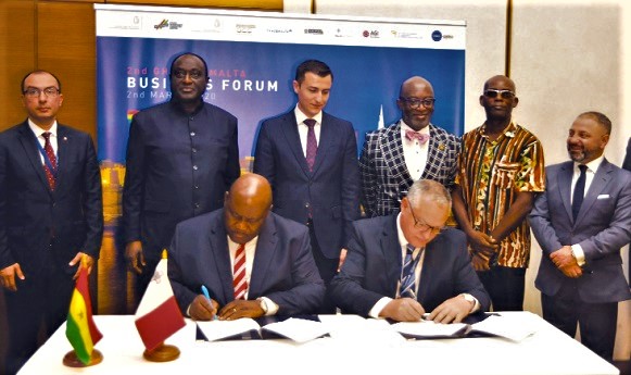 Professor Alex Dodoo, Director-General of the Ghana Standards Authority, and Dr Benjamin Micallef, Malta Medicine Authority, signing on behalf of their respective organisations