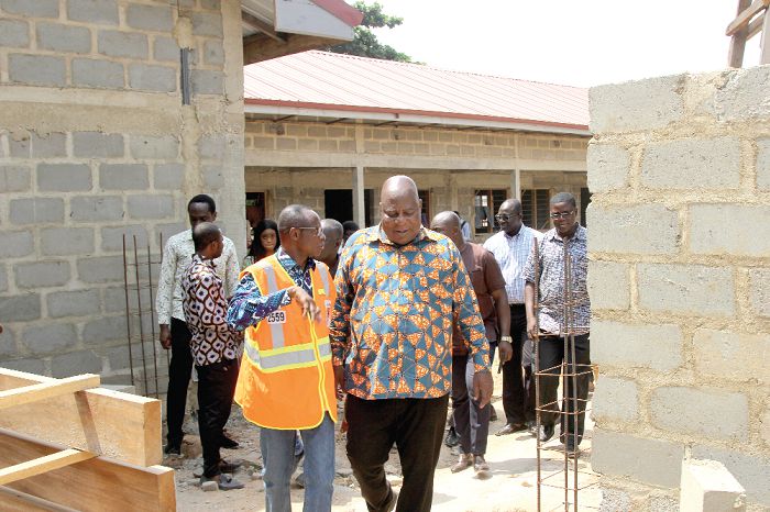  Mr Ishmael Ashietey (right) and some technical directors of GetFund inspecting one of the projects.Pictures: PAA KWESI GRANT
