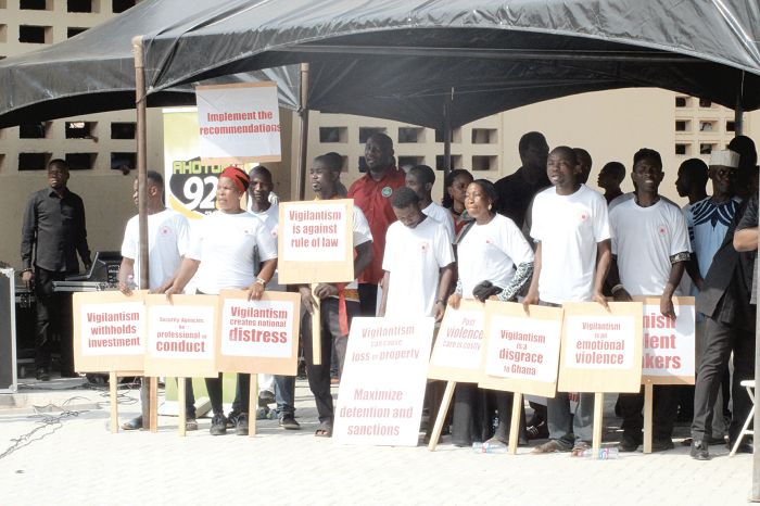  Some demonstrators with their placards