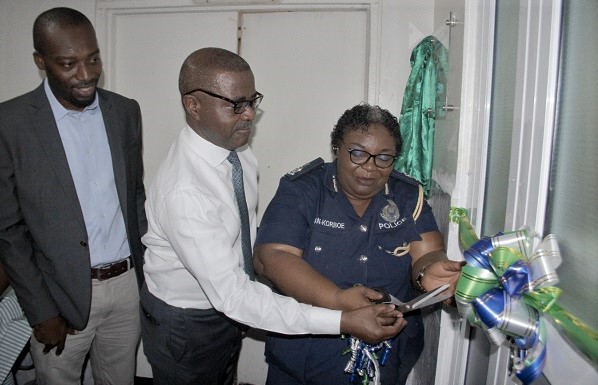 DCOP Dr Marian Tetteh Korboe (right) and Dr Paul Sekyere-Nyantakyi (2nd left) cutting a tape to inaugrate the ward. Looking on is Mr Alvin Katahene (left), Assistant Business Development Manager,  MDS-LANCET. Picture: EDNA SALVO-KOTEY