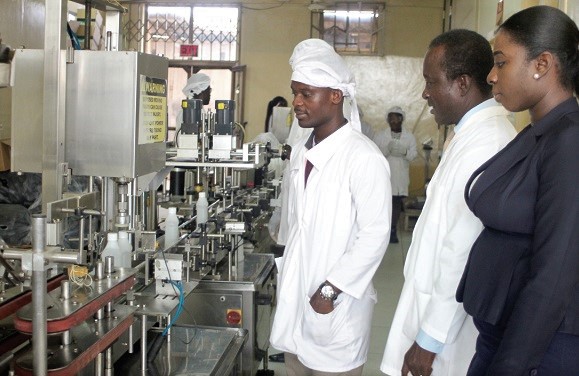 Professor Kwasi Ohemeng (middle), Ms Linda Agyemfra-Djan (right), Policy Manager, and Mr Ernest Attoh, a technician, observing the production process. Picture: GABRIEL AHIABOR