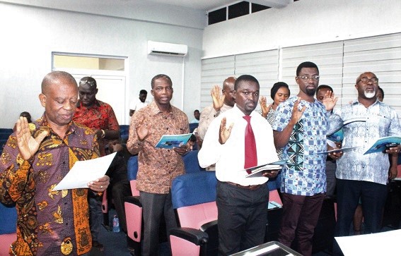 The newly elected council members of the  Ghana Publishers Association taking the oath of office. Picture: Patrick Dickson 