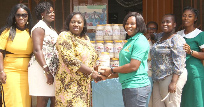 Ms. Linda Maka (3rd left), Chief Executive Officer of Salbix Foods, presenting the items to Ms. Bernice Okine (3rd right), Nutrition Officer of the Princess Marie Louise Children’s Hospital (PMLCH). With them are officials of Salbix Foods, and PMLCH. Picture: EDNA SALVO-KOTEY