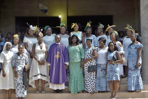 Some members of the 1999 Year group of St Louis Past Students Association after presenting the refurbished library (right) to the school