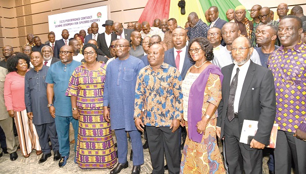 Vice-President Dr Mahamudu Bawumia (5th left) with some heads of organisations after the signing ceremony.