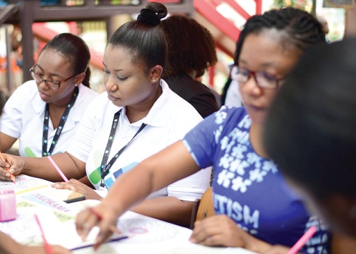 Staff of Standard Chartered Bank volunteering at the Autism Awareness Centre in Accra