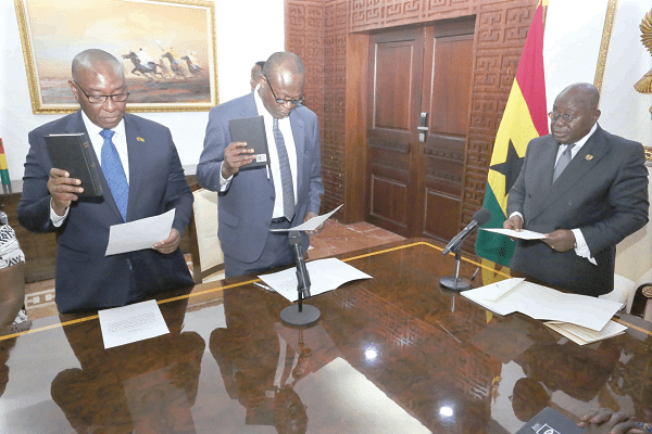 President Akufo-Addo administering the oath of office to Dr Samuel Adotey Anum (left), Ambassador designate for Libya, and Mr Jonathan Rexford Magnusen (2nd left), Ambassador designate for Niger. Picture: SAMUEL TEI ADANO