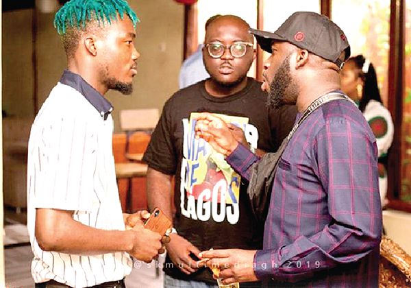 Lloyd Banko, General Manager, Sony Music West Africa (right), interacting with blogger Pep Junia (middle) and musician Camidoh (left)