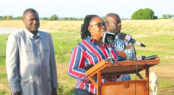 FLASHBACK: Mrs Mavis Hawa Koomson (middle) addressing the media during a visit to some dams in the Northern Region. With her are Mr Kojo Oppong Nkrumah, Information Minister (right) and Abdul-Majeed Haroun, CEO of the Northern Development Authority.