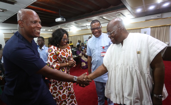 President Akufo-Addo interacting with Mr Ato Afful (left), MD, GCGL, while Mrs Mavis Kitcher (2nd left), Director, News, and Mr Kobby Asmah, Editor, Daily Graphic, look on.