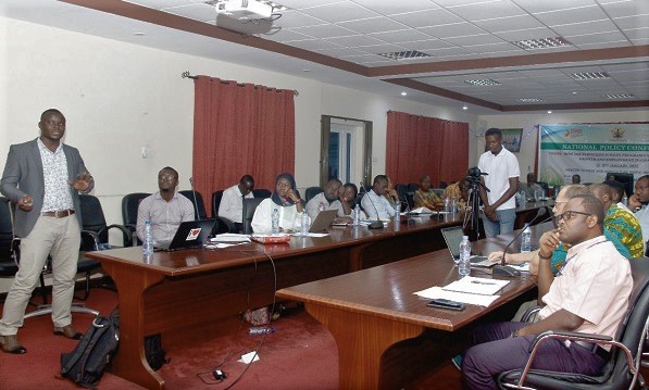 Mr Abdul Malik Iddisu (left) making a presentation on the implications of fertiliser subsidy programme