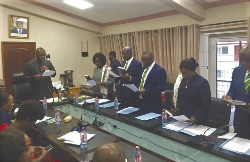 Dr Matthew Opoku Prempeh, the Minister of Education swearing in members of the CIB Governing Board