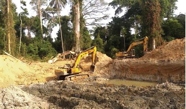 One of the pits dug by the illegal miners who have invaded the Oda River Forest Reserve in the Amansie Central District in the Ashanti Region
