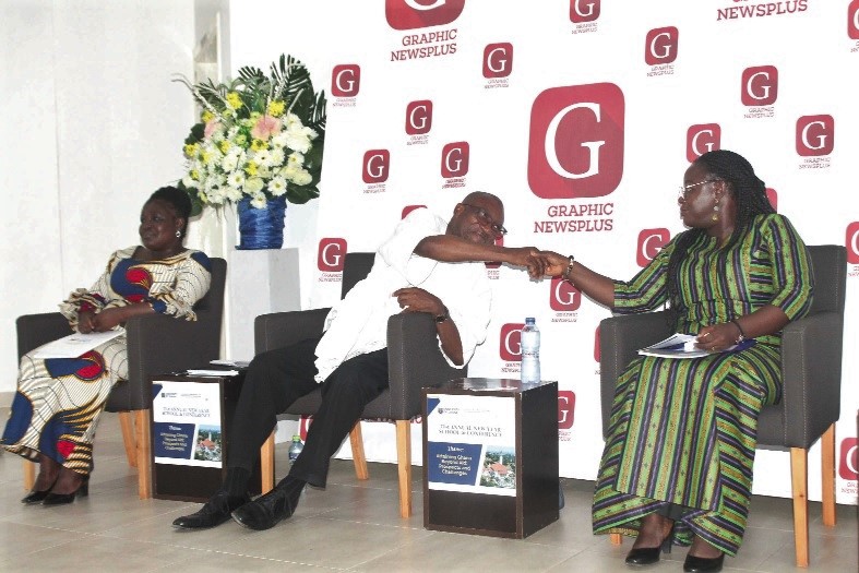 Prof. Michael Tagoe (middle), acting Provost of the College of Education, University of Ghana (UG), in a handclasp with Prof. Nana Aba Appiah Amfo, Pro-Vice-Chancellor, Academic and Students Affairs (ASA), UG, during the closing ceremony of the 71st Annual New Year School and Conference. Also in the photograph is Prof. Olivia Kwapong, acting Dean, School of Continuing and Distance Education, UG.