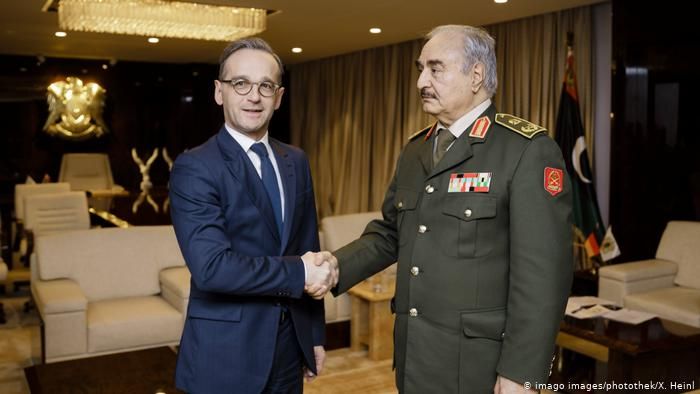 Germany's foreign minister traveled to Libya to convince Khalifa Haftar to attend the summit