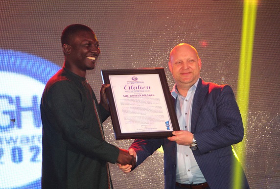 Mr Joe Ampem-Darko (left), Sales Manager of Ashfoam, presenting the award to Mr Roman Krabel