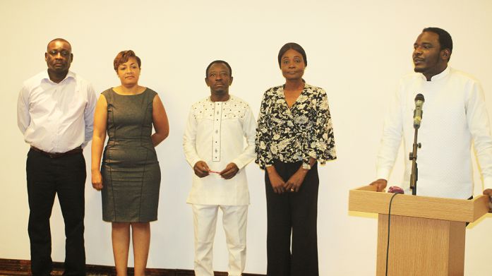 Mr Gilbert Odjidja (right), President of the E-Waste Round Table Association, speaking on behalf of the executive after the inaugural ceremony. Those with him are the other members of the executive. Picture: GABRIEL AHIABOR