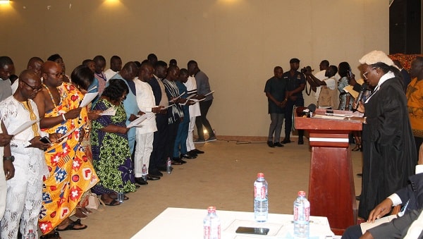 Her Ladyship Justice Afia Serwaa Asare-Botwe (right), Justice of the High Court, swearing in some assembly members. Picture: ESTHER ADJEI