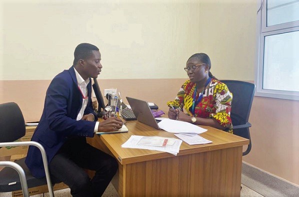 Dr Adwoa Kumiwa Asare Afrane (right), Specialist Paediatrician at the Department of Child Health of the Korle-Bu Teaching Hospital,  interacting with our reporter