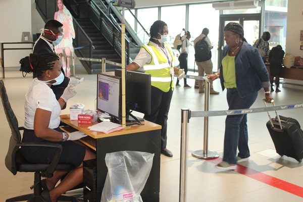 Some passengers who have arrived at the Kotoka International Airport being screened for the coronavirus. Picture: GABRIEL AHIABOR
