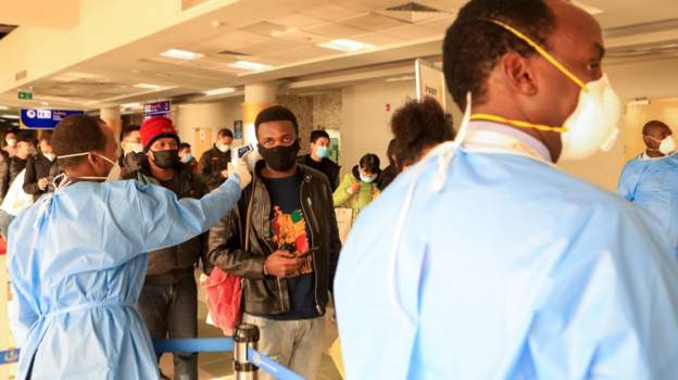 People coming from China are being screened when they arrive in African airportsImage caption: People coming from China are being screened when they arrive in African airports