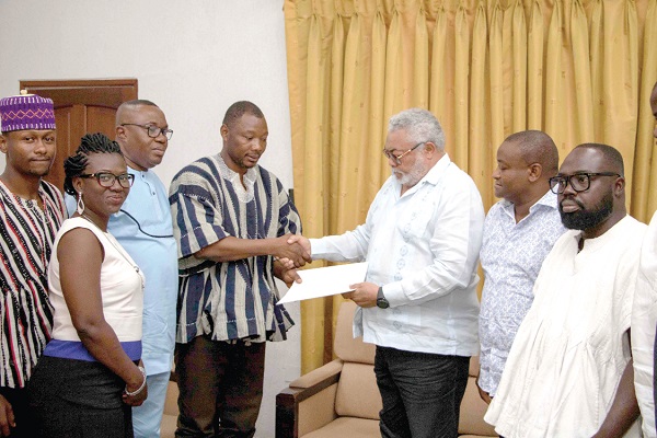 Former President Rawlings (3rd right) receiving the petition from Mr Bernard Mornah, spokesperson of the coalition