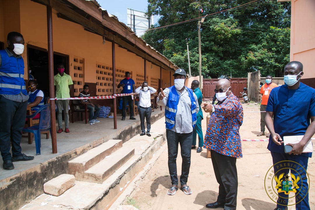 President Akufo-Addo (right) at the Kanda Cluster of Schools Registration Centre