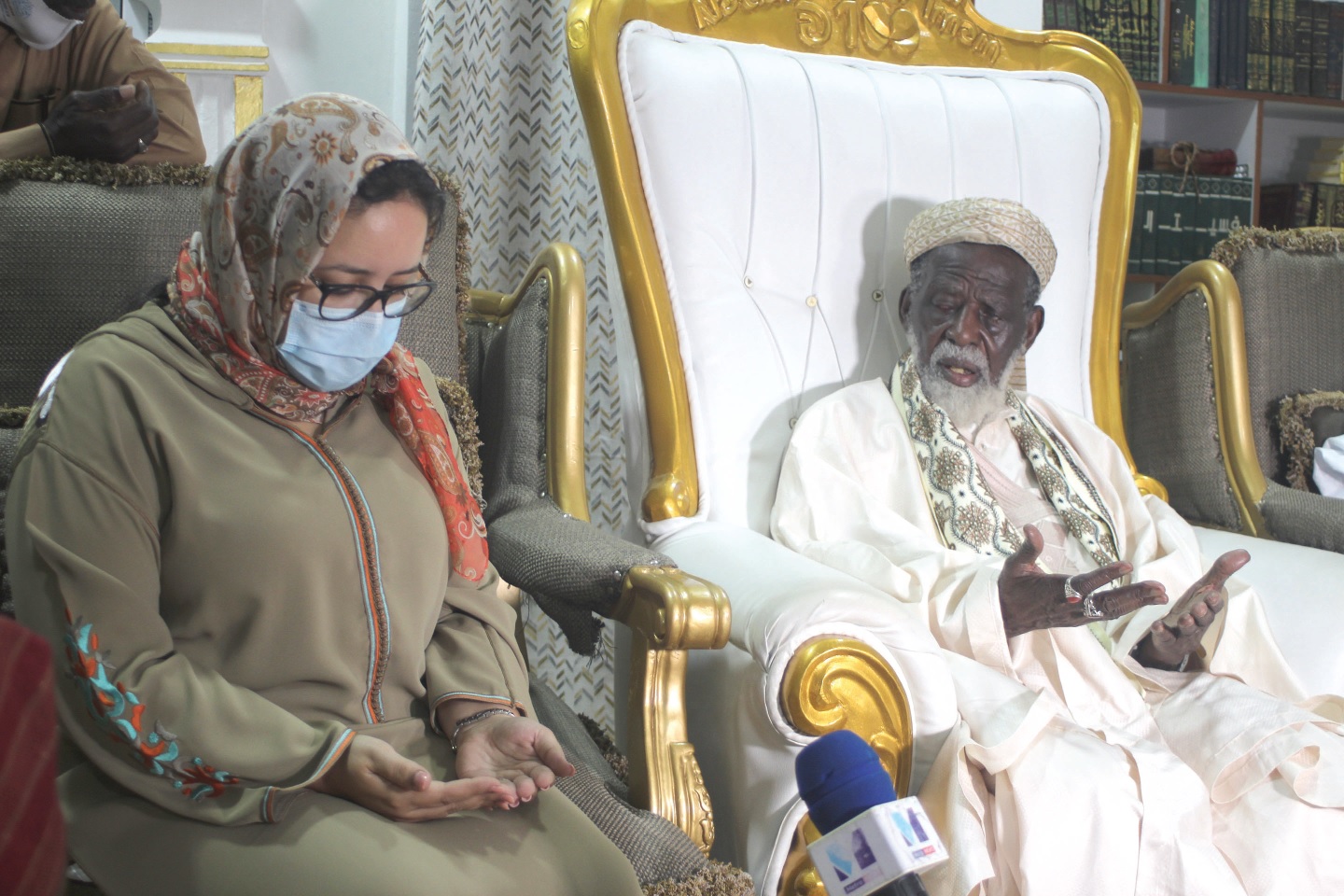 Shiekh Osman Nuhu Sharabutu( right), the Chief Imam, saying a word of prayer to Ms Imane Quaadil (left), the Moroccan Ambassador to Ghana, after the donation in Accra. Picture: GABRIEL AHIABOR