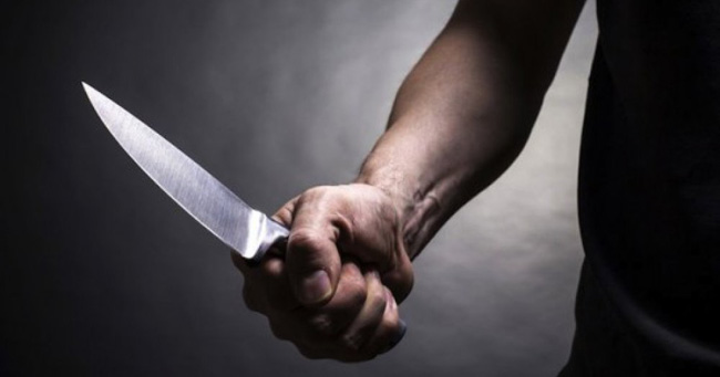 One person killed in a fight over a woman; Another battling for life at hospital