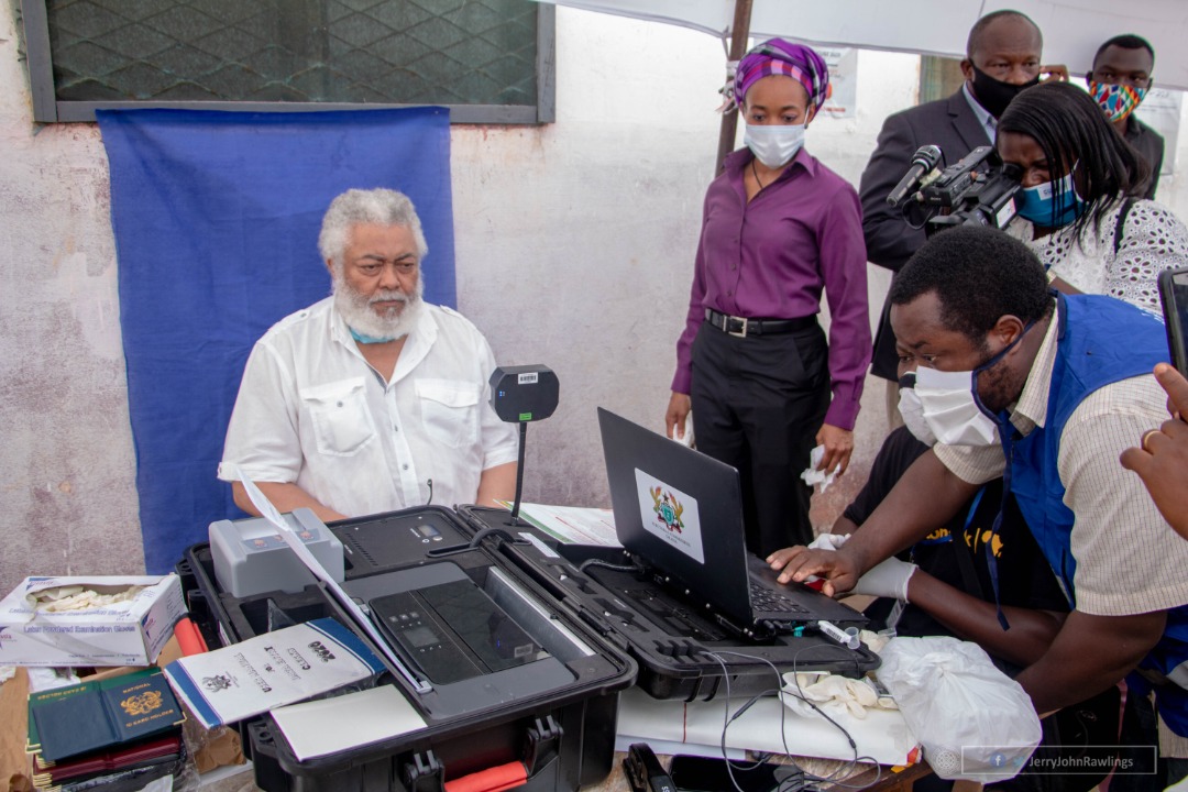 Former President Rawlings picks up new voter's ID card
