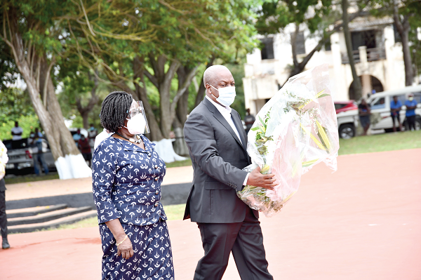  Former President John Dramani Mahama being accompanied by Prof. Naana Jane Opoku-Agyemang to lay the wreath. Picture: EBO HANSON