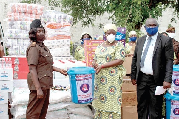 DSP Mary Asante-Sarfo (left), Second in Command of the Sunyani Female Prison, receiving the items from Deaconess Theodora Owusu Asubonteng