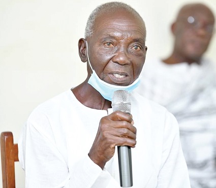 Nene Gustav Mate-Azu (inset), a senior member of the Council of Elders of the Akute Azu Royal Family of Kokum, responding to questions from the media