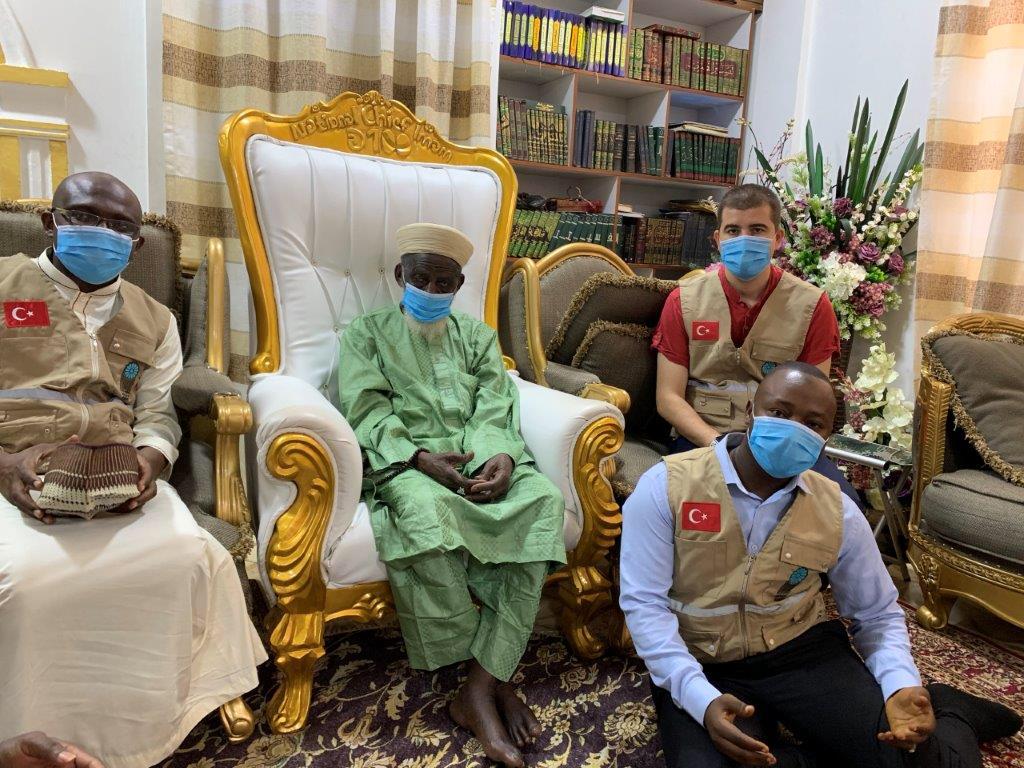 The donors in a photograph with Sheikh Osman Nuhu Sharubutu the National Chief Imam, at his residence