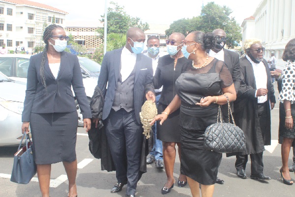 Mrs Betty Mould-Iddrisu (right), Mrs Marietta Brew Appiah–Opong (4th left), both former Attorneys General, interacting with Lawyer Kudzo Tameklo (2nd left) after the court proceedings in Accra. Those with them include Mrs Joyce Bawah Mogtari (left)  and Mr Abraham Amaliba (arrowed), both members of the NDC. Pictures: GABRIEL AHIABOR