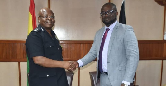 James Oppong Boanuh (left), the IGP recently met with the GFA boss, Kurt Okraku, to discuss football related security