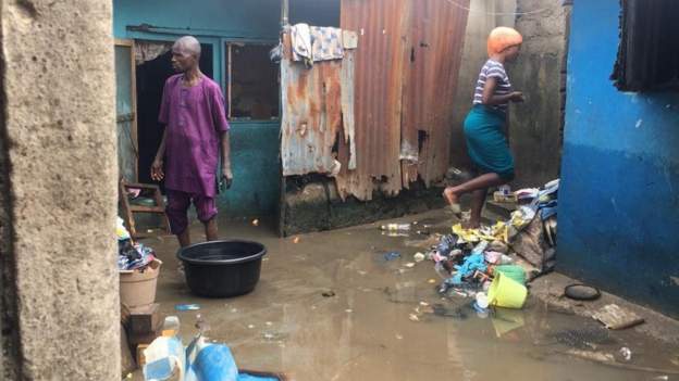 Residents in Agege are trying to save what they can from their flooded homes