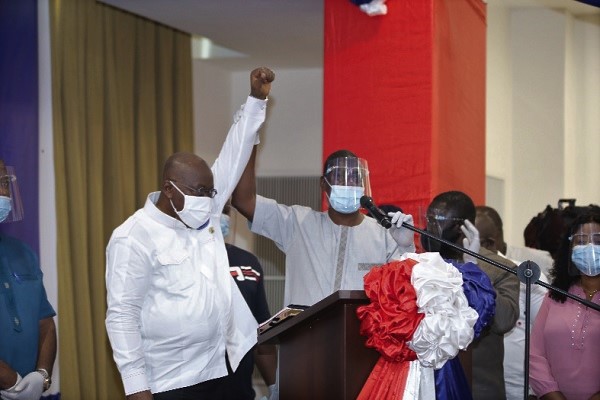 President Akufo-Addo being acclaimed by Mr Samuel Tettey, Deputy Commissioner of the Electoral Commission, to the National Council of the NPP as the flagbearer. Picture: SAMUEL TEI ADANO