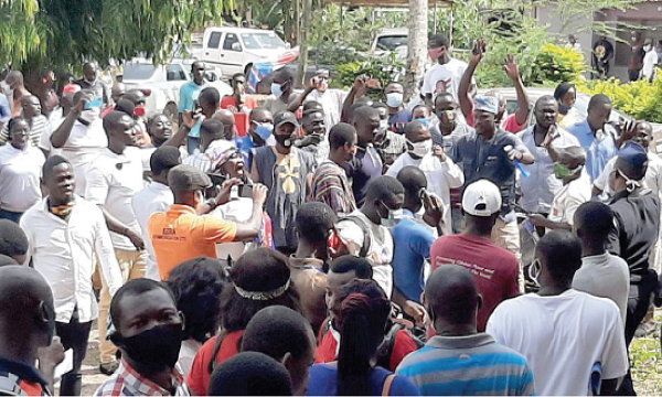 Supporters of NPP cheering Mr Emmanuel Marfo, the MP for Oforikrom,  after he had been declared winner. Picture: Felix Baidoo