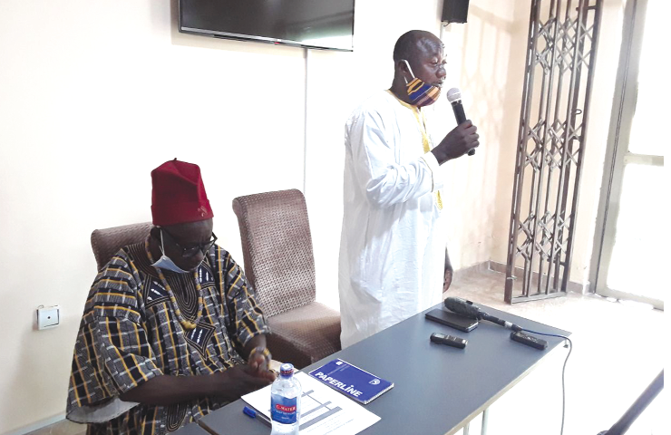 Mr Abdul-Rahman Mohammed (right), the National President of the PFAG, addressing the validation workshop at Bolgatanga 